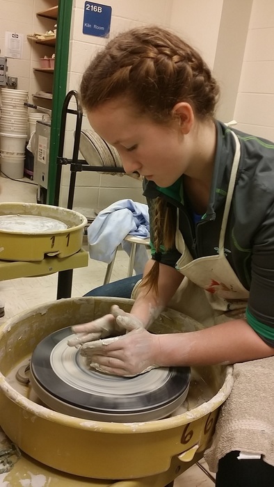 Hailey on the pottery wheel