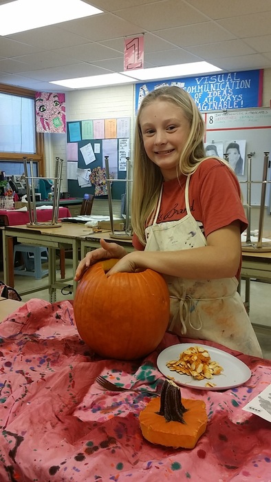 Some pics of student council members carving jack-o-lanterns for the school dance.